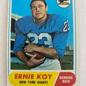 Topps Blue and White Football Card with Red Accents